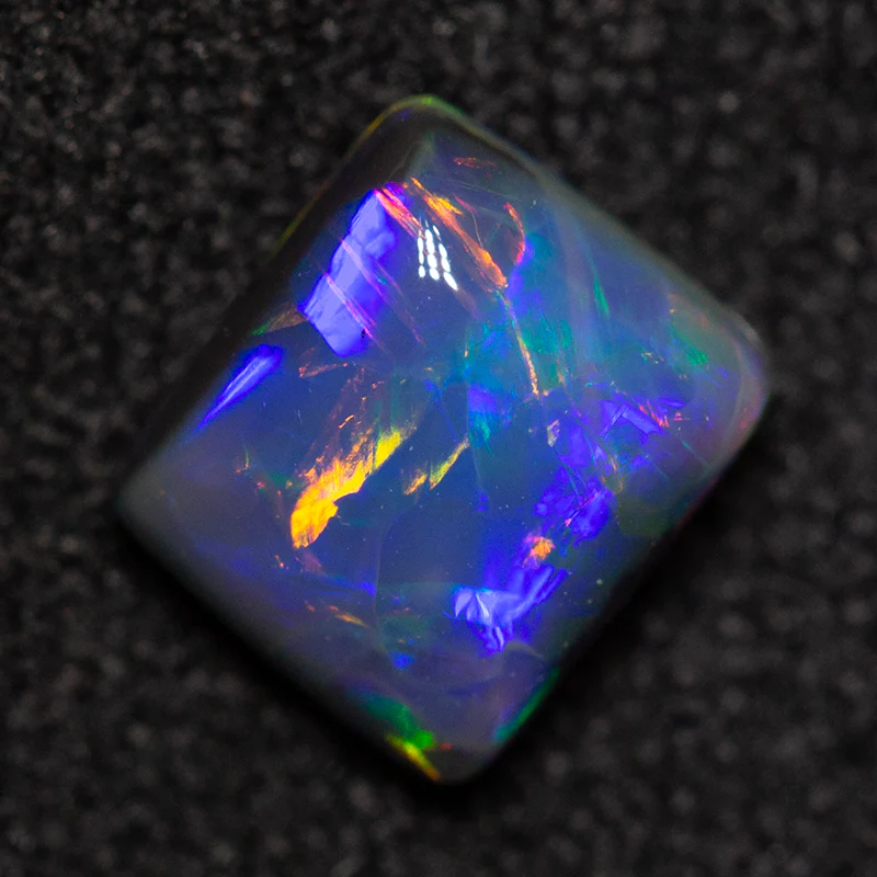 0.82 ct double-sided black opal 6.1x5.4x3.4mm - Image 5