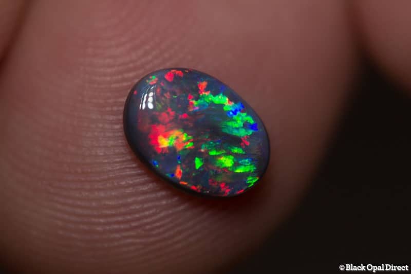0.82 ct gem black opal 8.3x6x3mm - Image 2