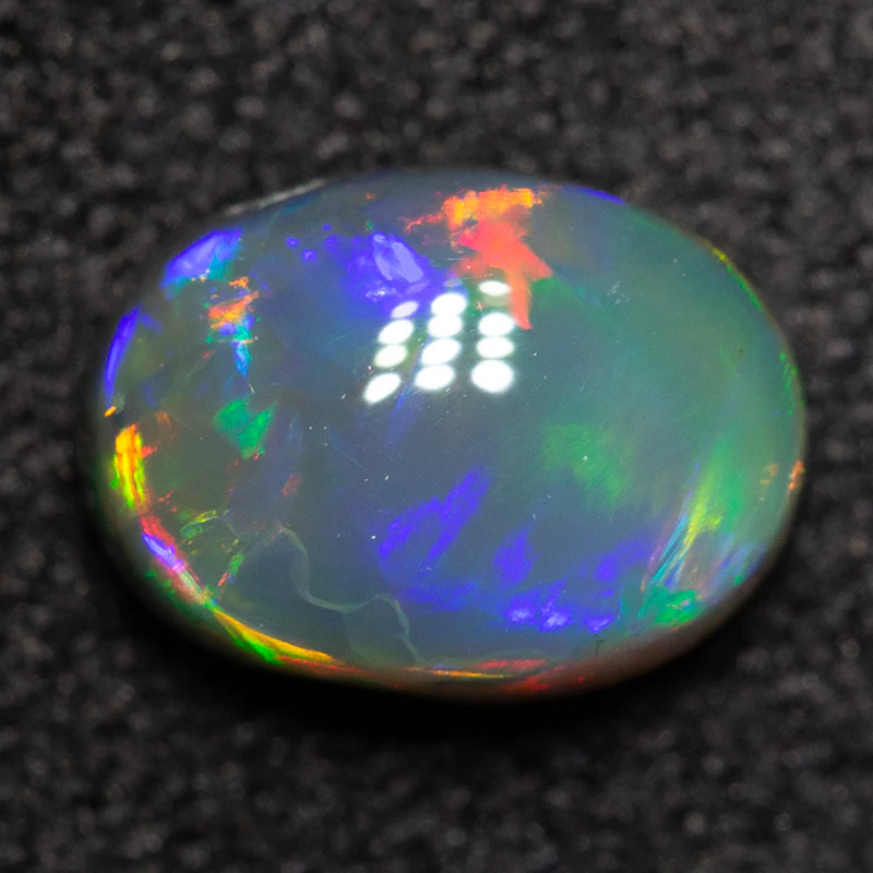 0.83 ct black opal 7.3x5.3x3.3mm - Image 3
