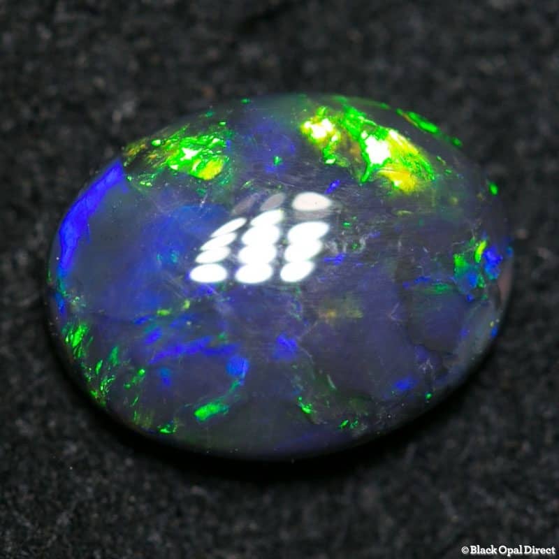 0.83 ct black opal 7.5x6x2mm - Image 2