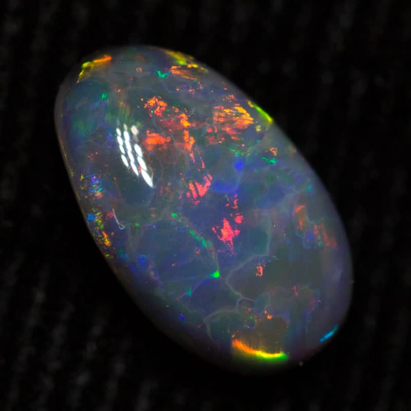 0.83 ct black opal 8.5x5x3mm - Image 2