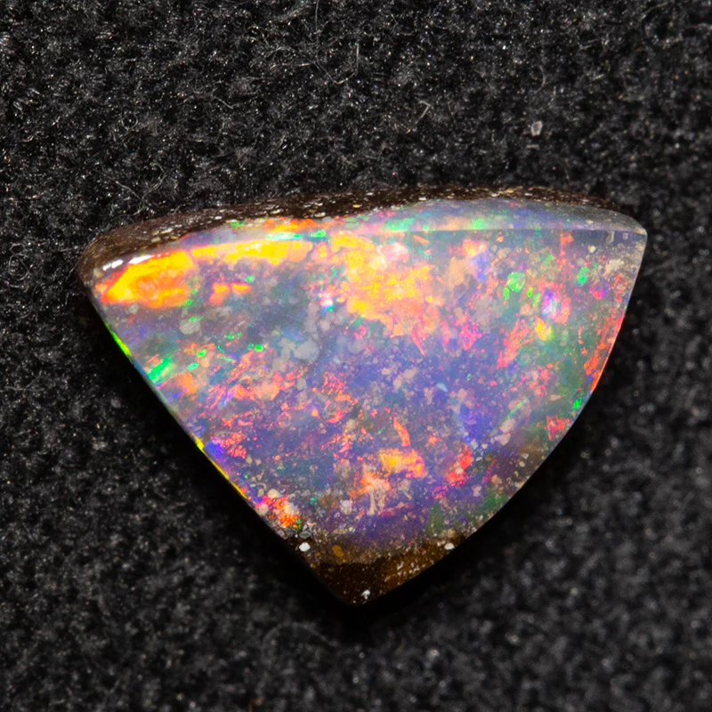 0.83 ct boulder opal 8.3x5.6x2.4mm - Image 2