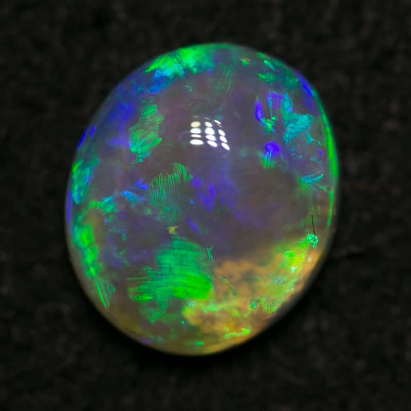 0.83 ct crystal opal 7x6x3mm - Image 2