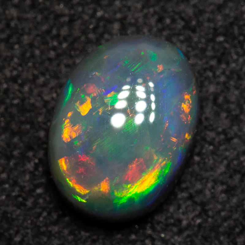 0.83 ct dark opal 6.9x5.1x3.2mm - Image 2