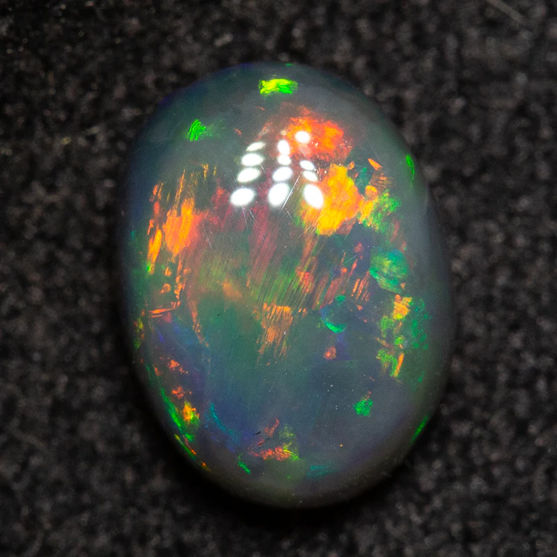 0.83 ct dark opal 6.9x5.1x3.2mm - Image 3