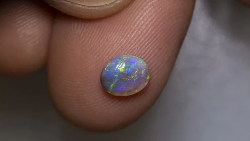 0.83 ct dark opal 7x6x3mm - Image 2