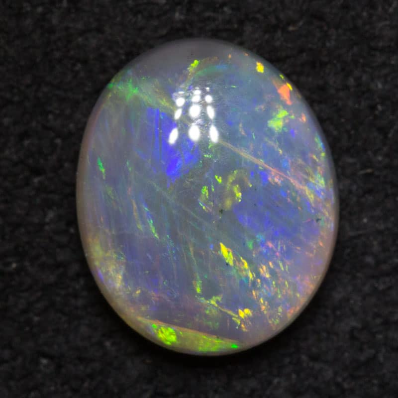0.83 ct dark opal 7x6x3mm - Image 3