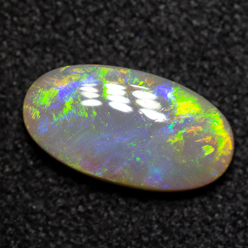 0.83 ct dark opal 9x5x2mm - Image 2