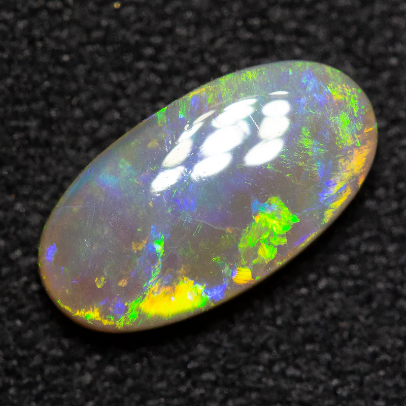 0.83 ct dark opal 9x5x2mm - Image 3