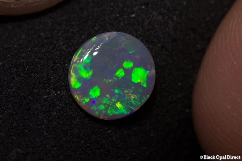 0.83 ct semi black opal 7x6.5x2mm - Image 3
