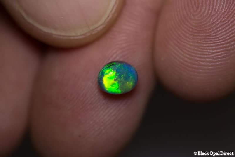 0.84 ct black opal 6.3x4.9x4mm - Image 3