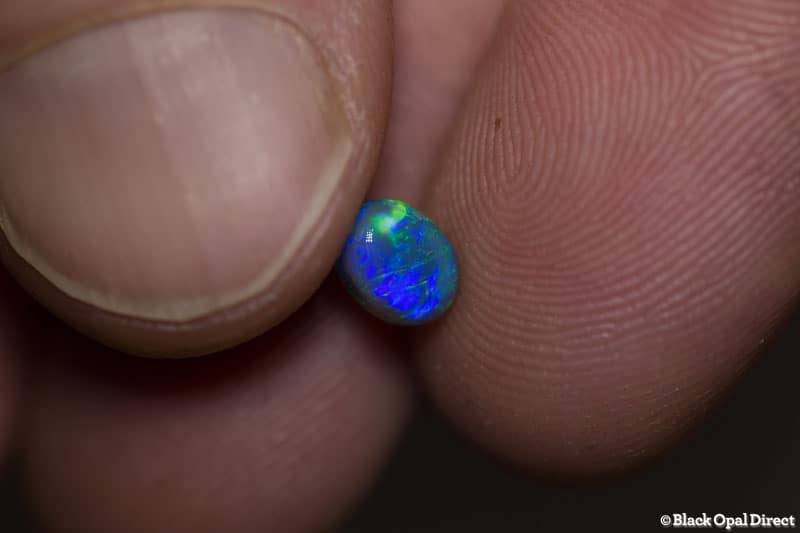 0.84 ct black opal 6.3x4.9x4mm - Image 4