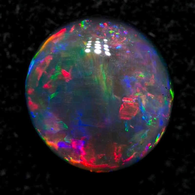 0.84 ct black opal gem 6.3x6x3mm - Image 4