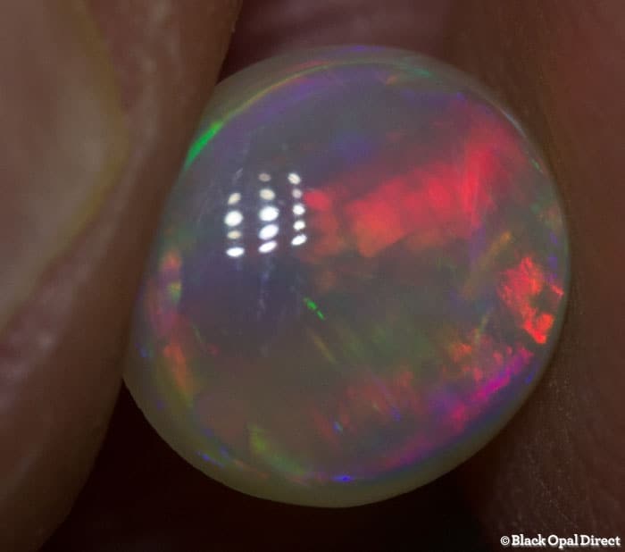0.84 ct crystal opal 7x6.5x3mm - Image 2