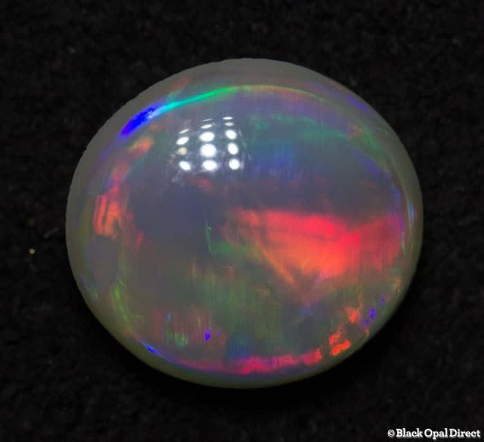 0.84 ct crystal opal 7x6.5x3mm - Image 3
