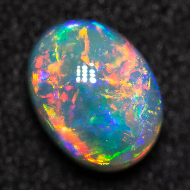 0.84 ct dark opal 6.8x5.3x3.8mm - Image 2