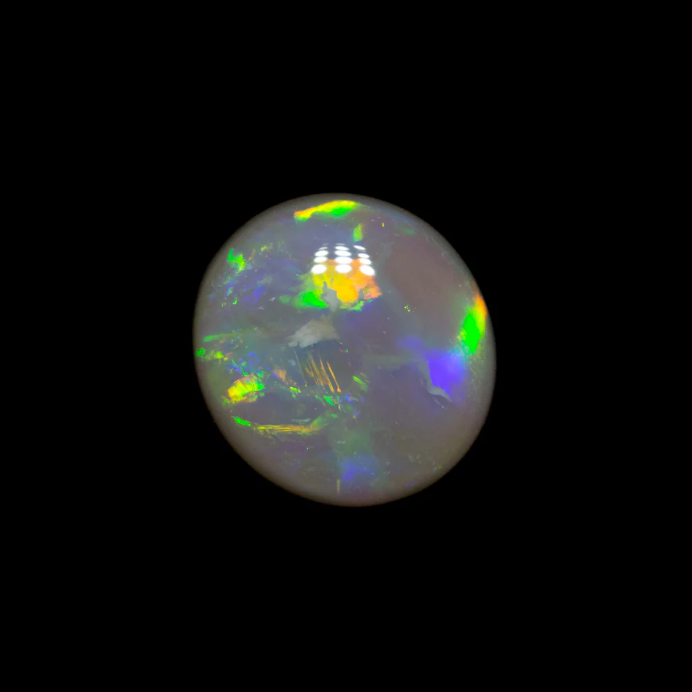 0.84 ct dark opal 7.3x6.8x2.7mm - Image 2