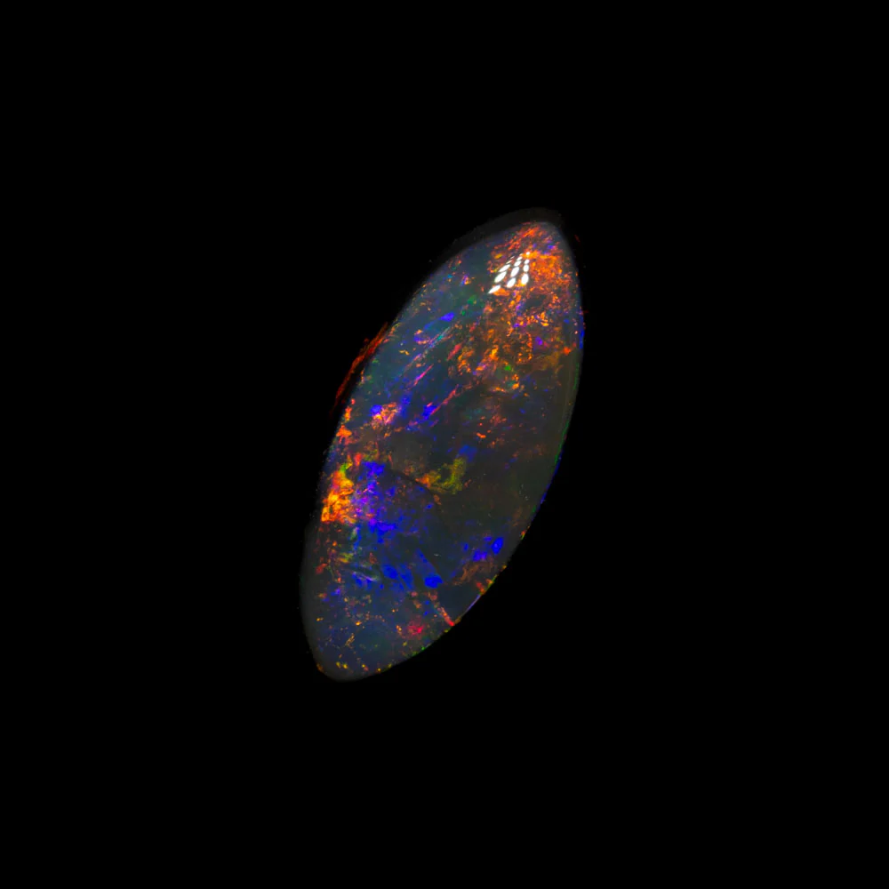 0.84 ct double-sided black opal 9.6x4.5x2.8mm - Image 2