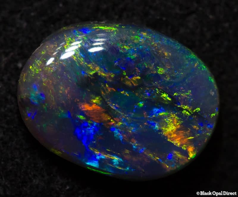 0.84 ct gem semi black opal 8x6x2mm - Image 2