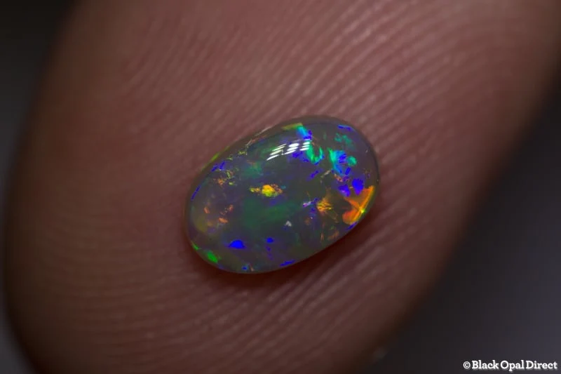 0.84 ct semi black opal 8x5x3mm - Image 2