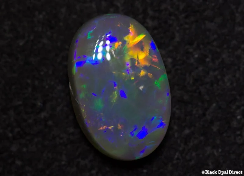 0.84 ct semi black opal 8x5x3mm - Image 3