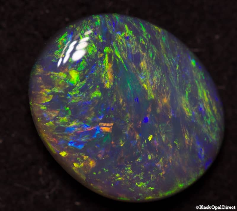 0.84 ct semi black opal 8x7x2mm - Image 2
