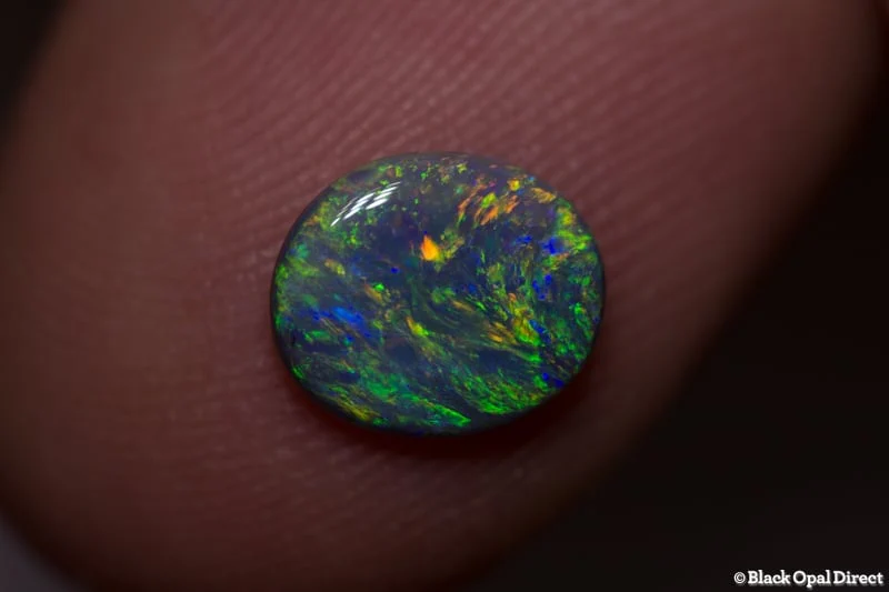 0.84 ct semi black opal 8x7x2mm - Image 3
