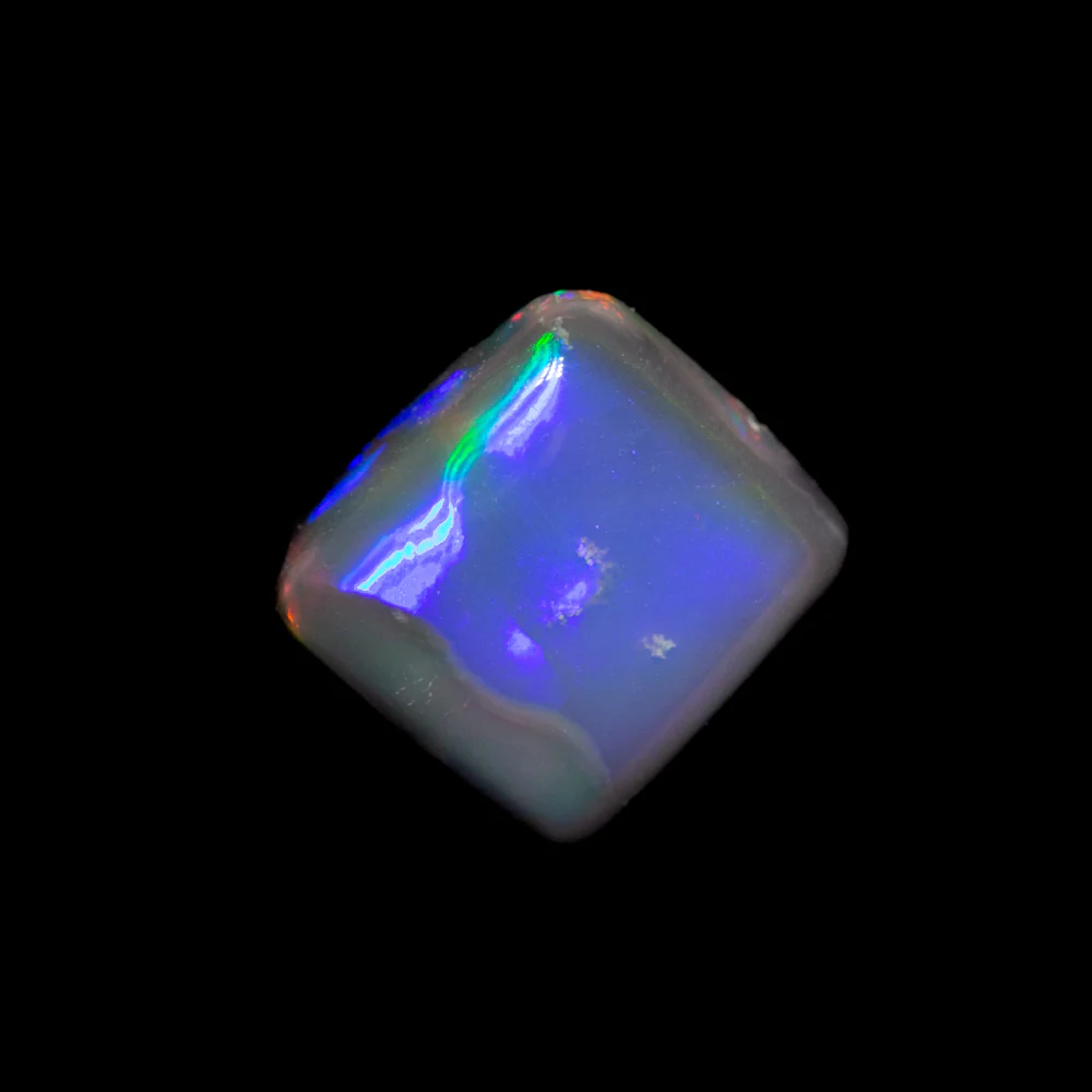 0.85 ct black opal 6.3x5.8x2.8mm - Image 2