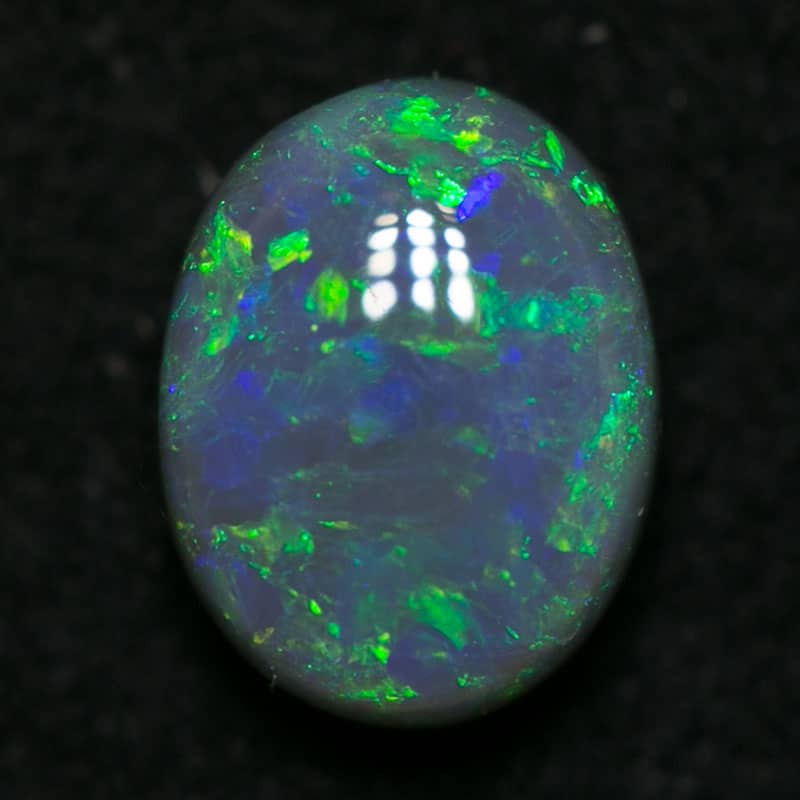 0.85 ct black opal 6.5x5x3mm - Image 2