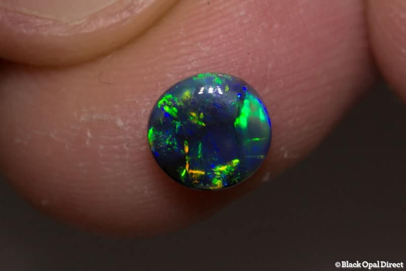 0.85 ct black opal 6mm round x3mm - Image 3