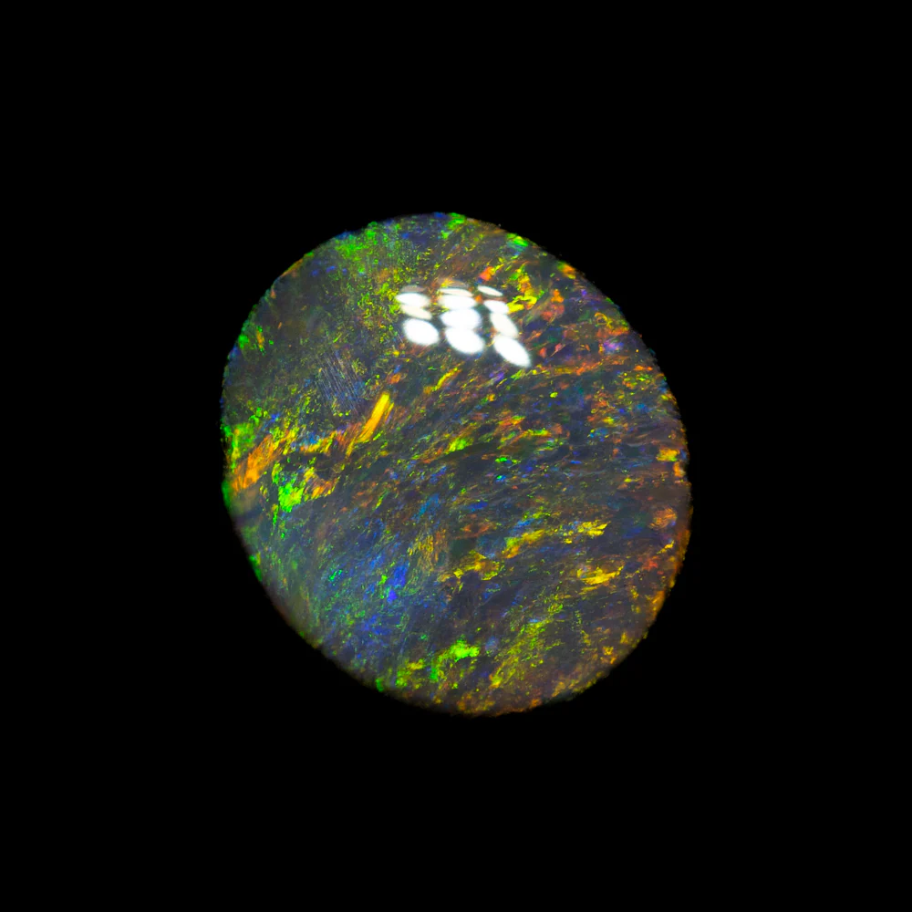 0.85 ct black opal 8x7x2.2mm - Image 2