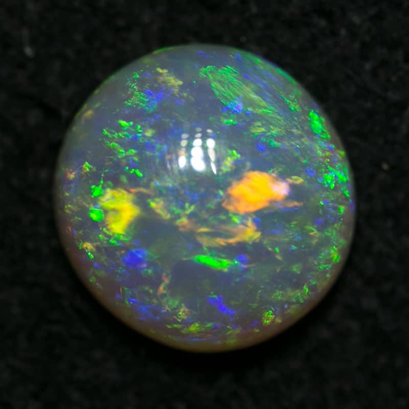 0.85 ct crystal opal 6.5mm round x 3mm - Image 2