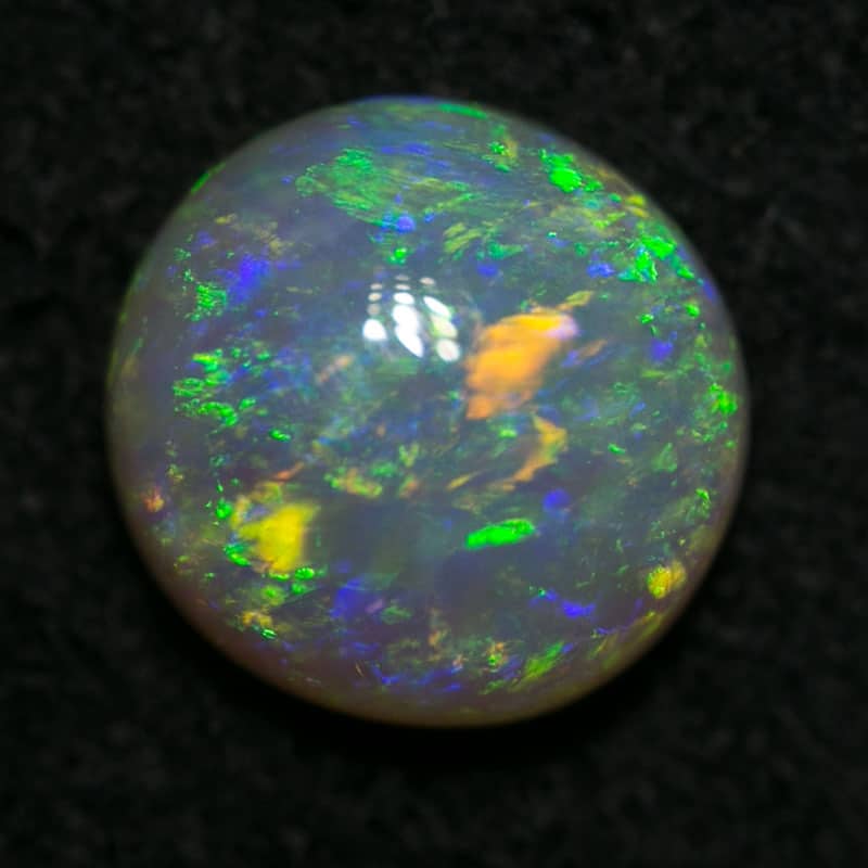 0.85 ct crystal opal 6.5mm round x 3mm - Image 3