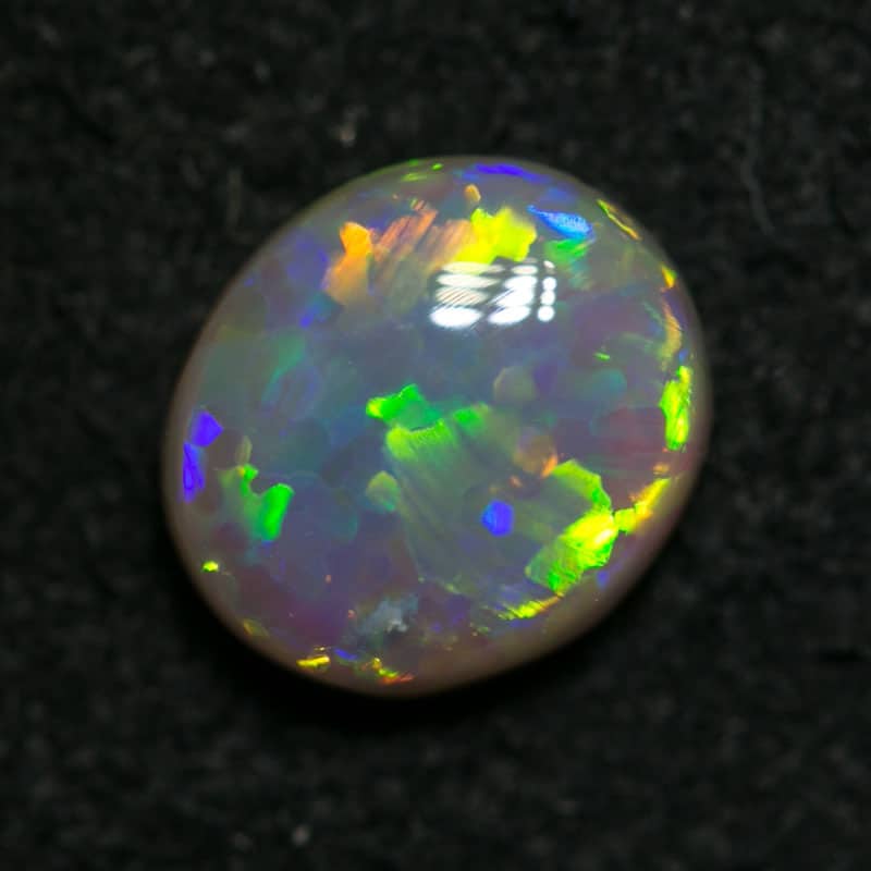 0.85 ct crystal opal 7x6x3mm - Image 2