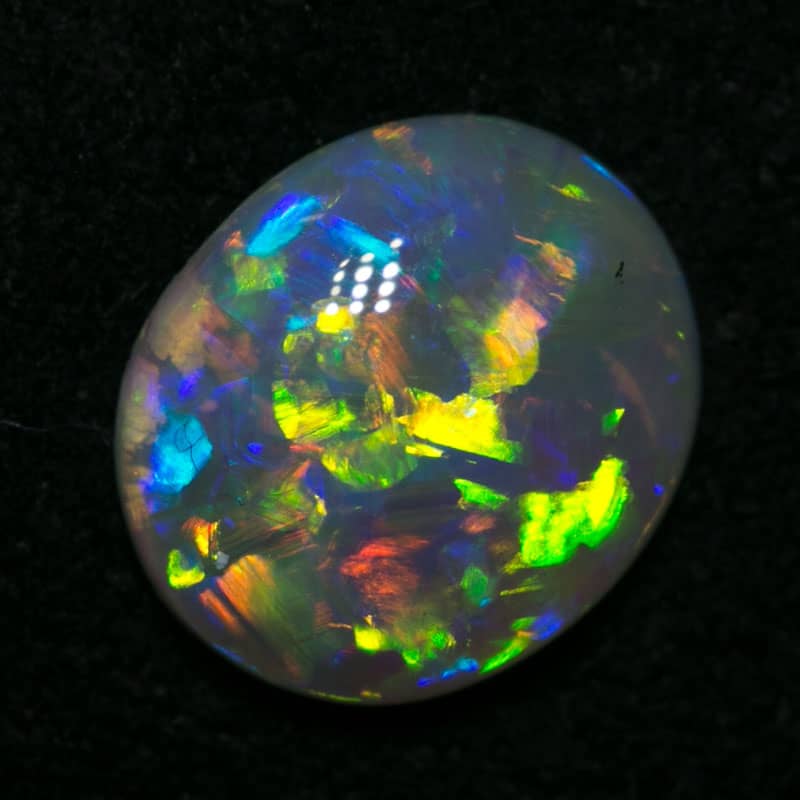 0.85 ct crystal opal 8x7x2mm - Image 2