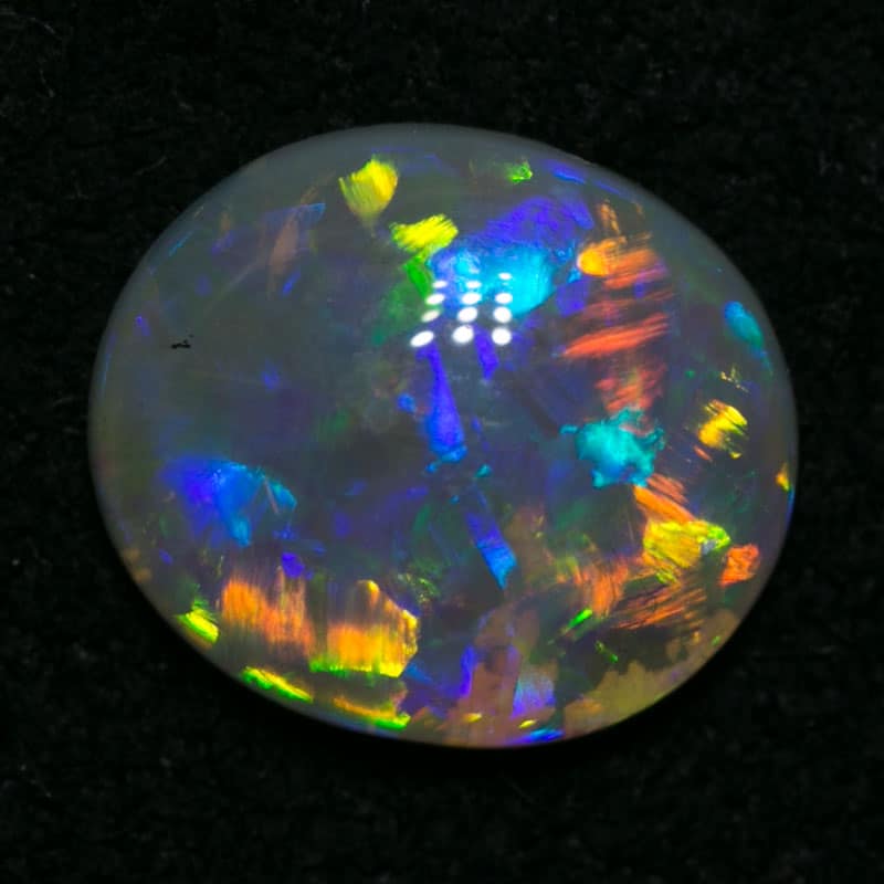 0.85 ct crystal opal 8x7x2mm - Image 4