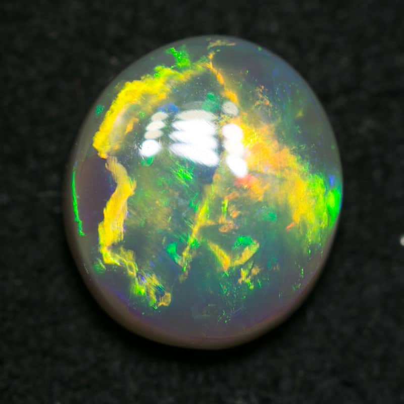 0.85 ct dark crystal opal 7x6x3mm - Image 3