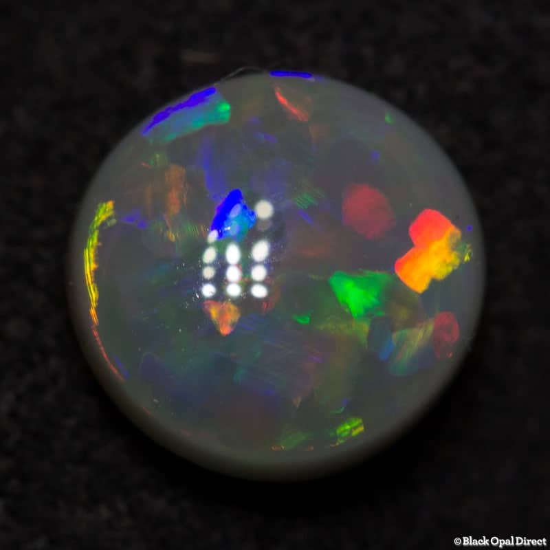0.85 ct semi black opal 7mm round x 3mm - Image 3