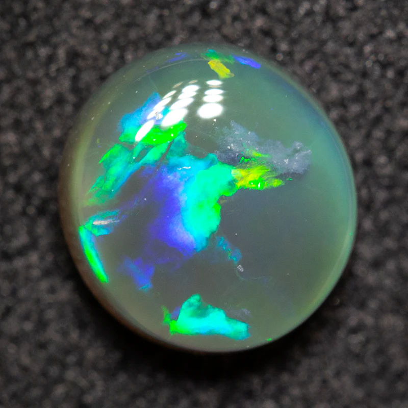 0.86 ct black crystal opal 6.2x6.2x3.3mm - Image 2