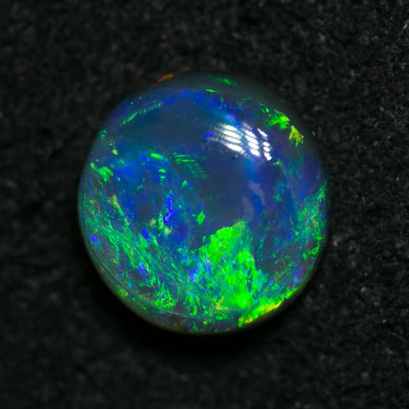 0.86 ct black opal 6.5x6.5x3mm - Image 2