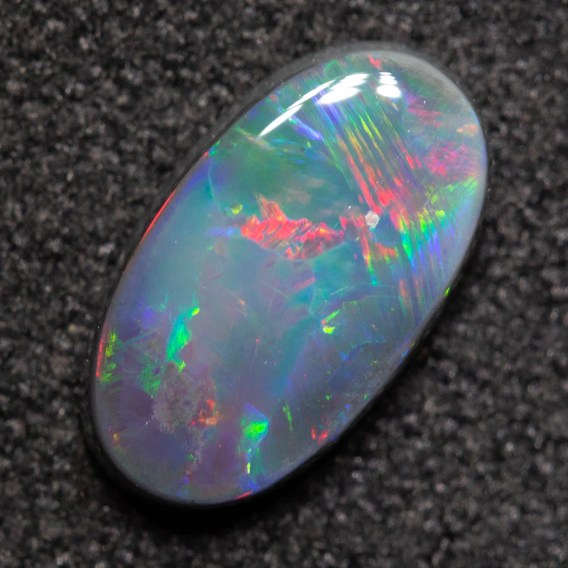 0.86 ct black opal 9x5.1x2.3mm - Image 2