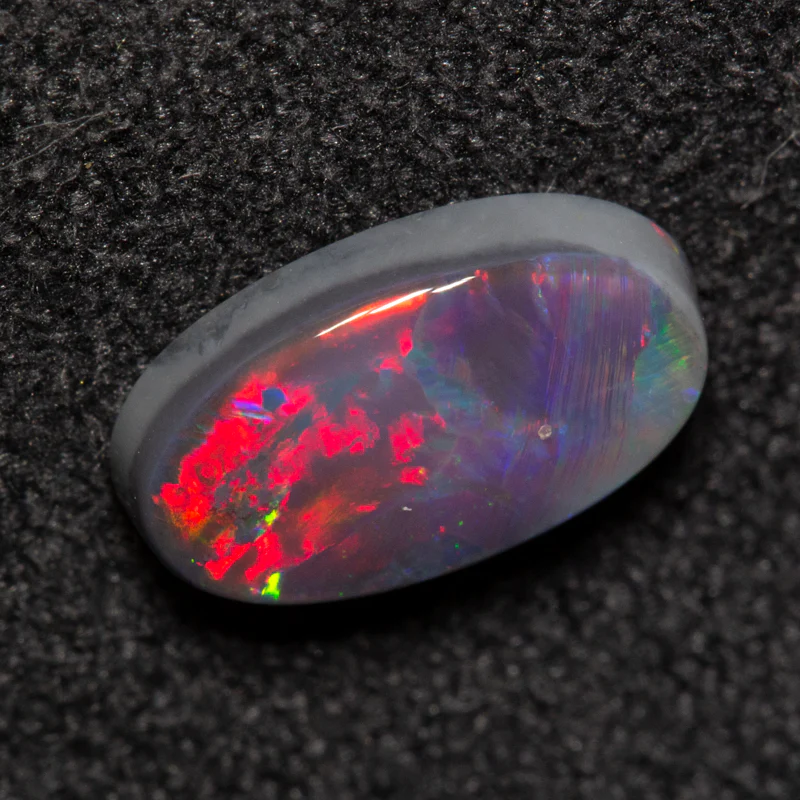 0.86 ct black opal 9x5.1x2.3mm - Image 5