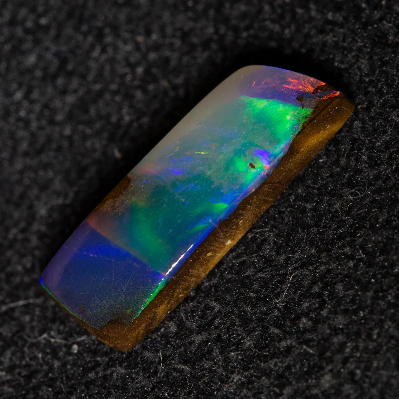 0.86 ct boulder opal 10.2x3.5x2.3mm - Image 2