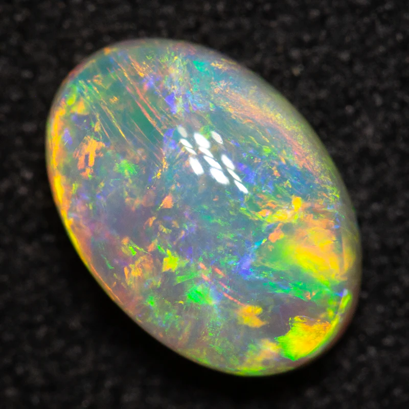 0.86 ct crystal opal 7.8x5.4x3.2mm - Image 4