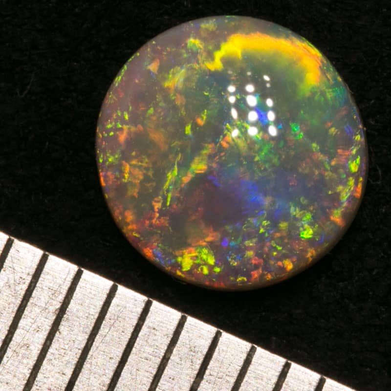 0.86 ct crystal opal 7mm round x2mm - Image 3