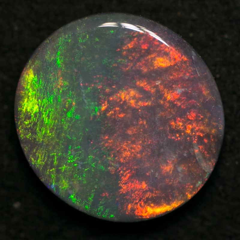 0.86 ct dark opal 8x7.5x2mm - Image 3