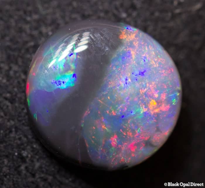 0.86 ct parti colored opal 8x7x2mm - Image 2