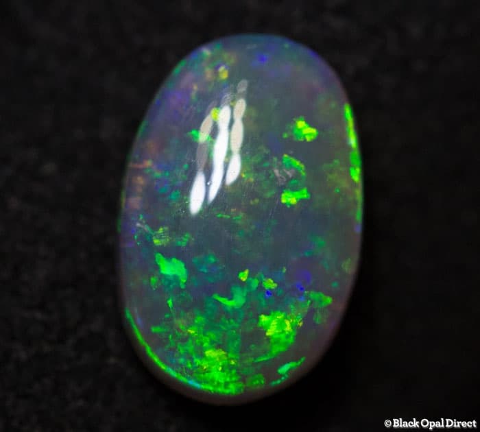0.86 ct semi black opal 9x6x3 - Image 2
