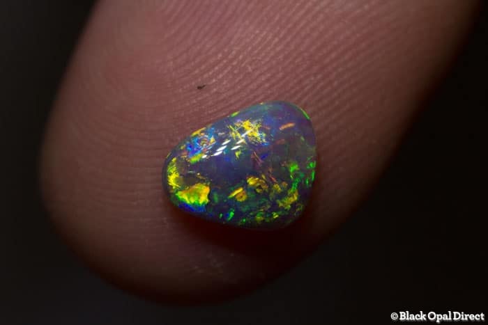 0.86 ct semi black crystal opal 8.5x7x2.5mm - Image 2