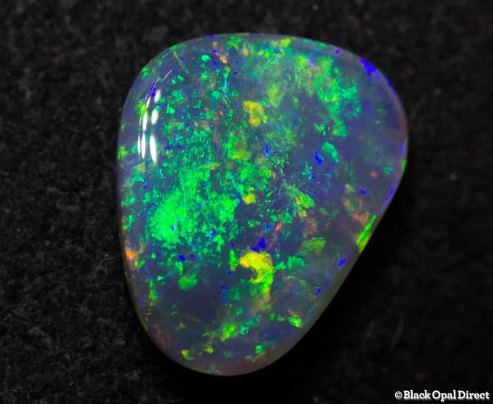 0.86 ct semi black crystal opal 8.5x7x2.5mm - Image 3